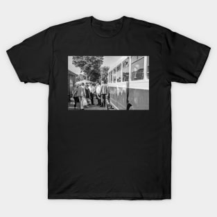 Vintage bus collecting passengers in the Norfolk town of Sheringham T-Shirt